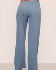 Model is wearing Pointelle Pant in Faded Denim