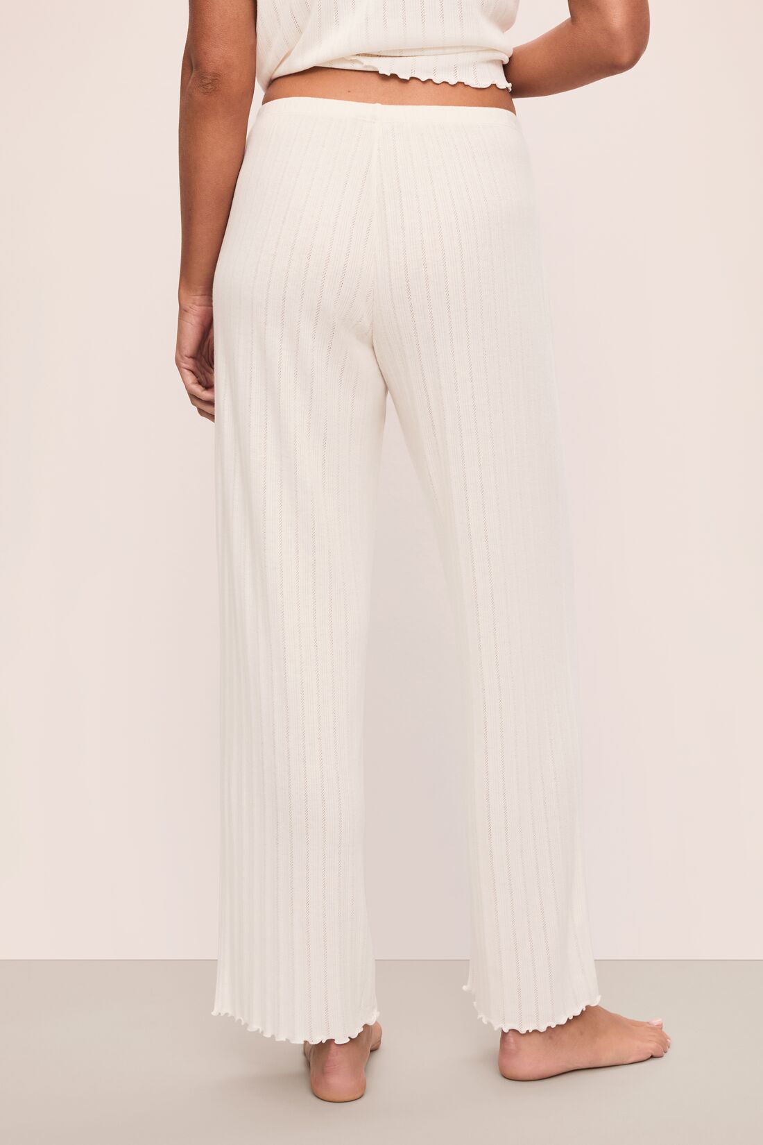 Model is wearing Pointelle Pant in Ivory