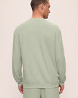 Model is wearing Mens French Terry Sweatshirt in Matcha