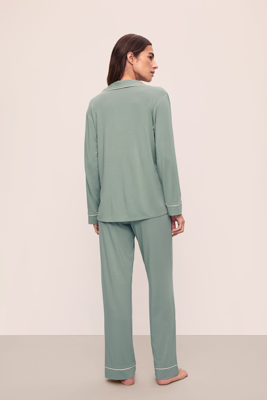 Model is wearing Gisele TENCEL™ Modal Long PJ Set in Eucalyptus/Ivory