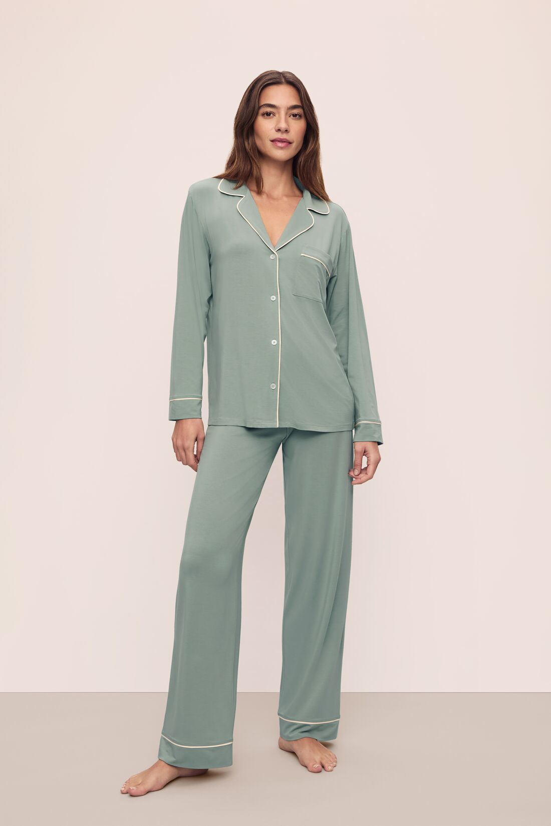 Model is wearing Gisele TENCEL™ Modal Long PJ Set in Eucalyptus/Ivory