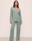 Model is wearing Gisele TENCEL™ Modal Long PJ Set in Eucalyptus/Ivory