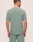 Model is wearing Henry TENCEL™ Modal TENCEL™ Modal Short PJ Set in Eucalyptus