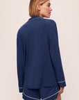 Model is wearing Gisele TENCEL™ Modal Long Sleeve Short PJ Set in Navy/Ivory