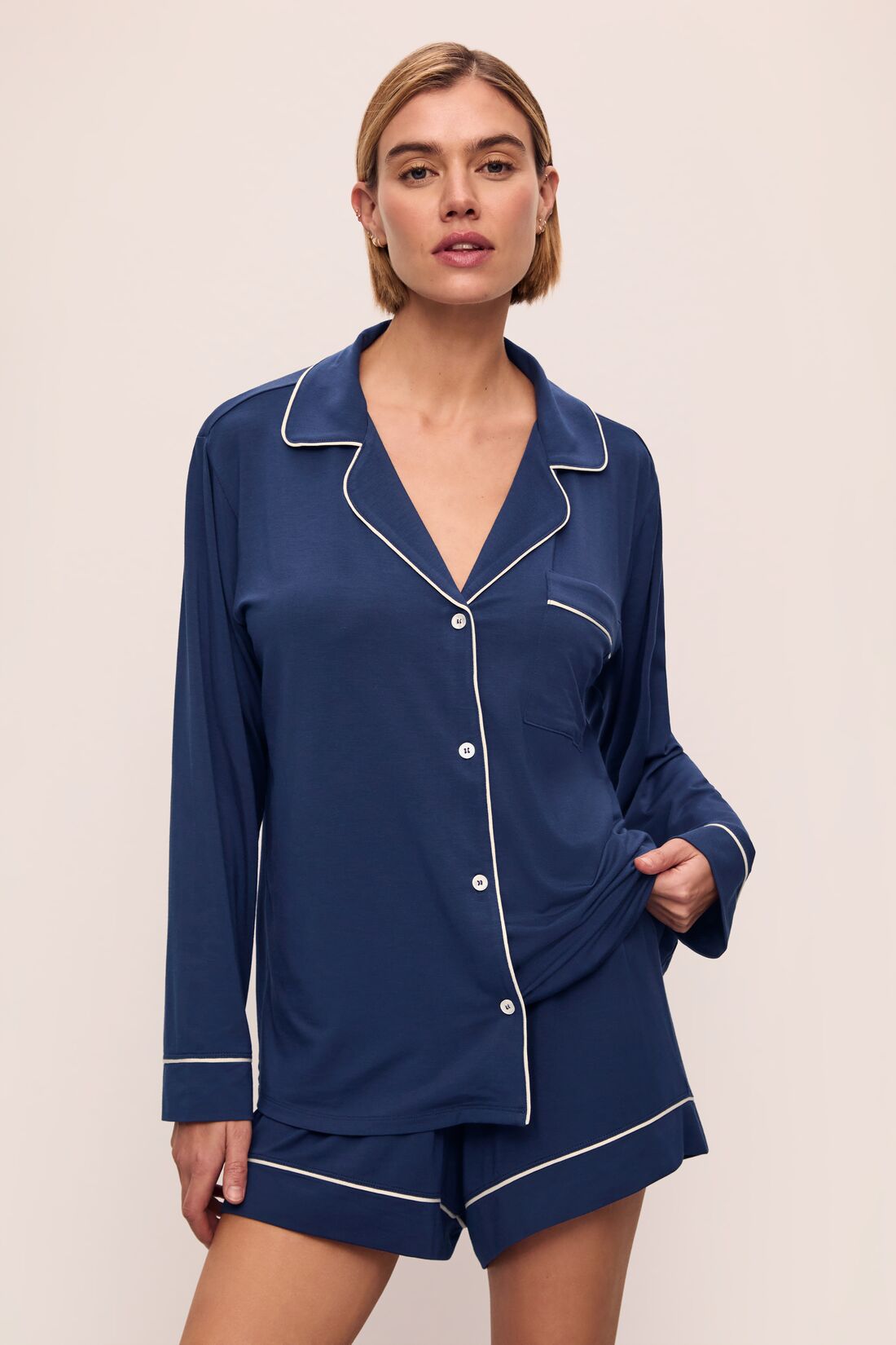 Model is wearing Gisele TENCEL™ Modal Long Sleeve Short PJ Set in Navy/Ivory