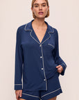 Model is wearing Gisele TENCEL™ Modal Long Sleeve Short PJ Set in Navy/Ivory