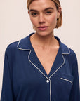 Model is wearing Gisele TENCEL™ Modal Long Sleeve Short PJ Set in Navy/Ivory