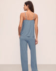 Model is wearing Gisele TENCEL™ Modal Cami & Pant PJ Set in Faded Denim