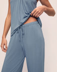 Model is wearing Gisele TENCEL™ Modal Cami & Pant PJ Set in Faded Denim