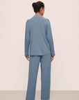 Model is wearing Gisele TENCEL™ Modal Long PJ Set in Faded Denim/Ivory