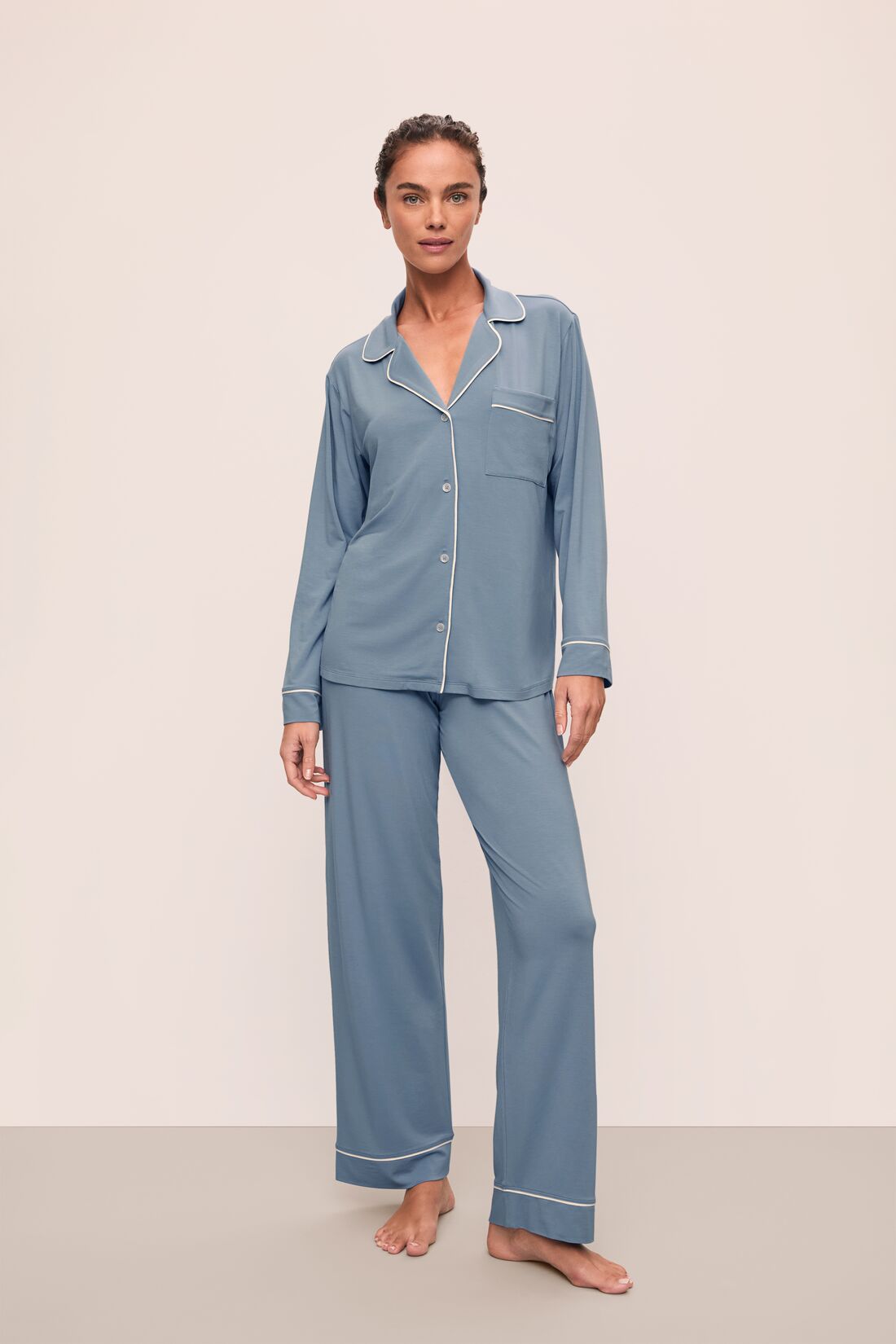 Model is wearing Gisele TENCEL™ Modal Long PJ Set in Faded Denim/Ivory