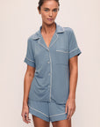 Model is wearing Gisele TENCEL™ Modal Relaxed Short PJ Set in Faded Denim/Ivory