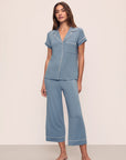 Model is wearing Gisele TENCEL™ Modal Short Sleeve Cropped PJ Set in Faded Denim/Ivory