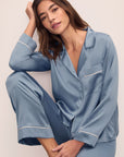 Model is wearing Inez Washable Silk Long PJ Set in Faded Denim/Ivory