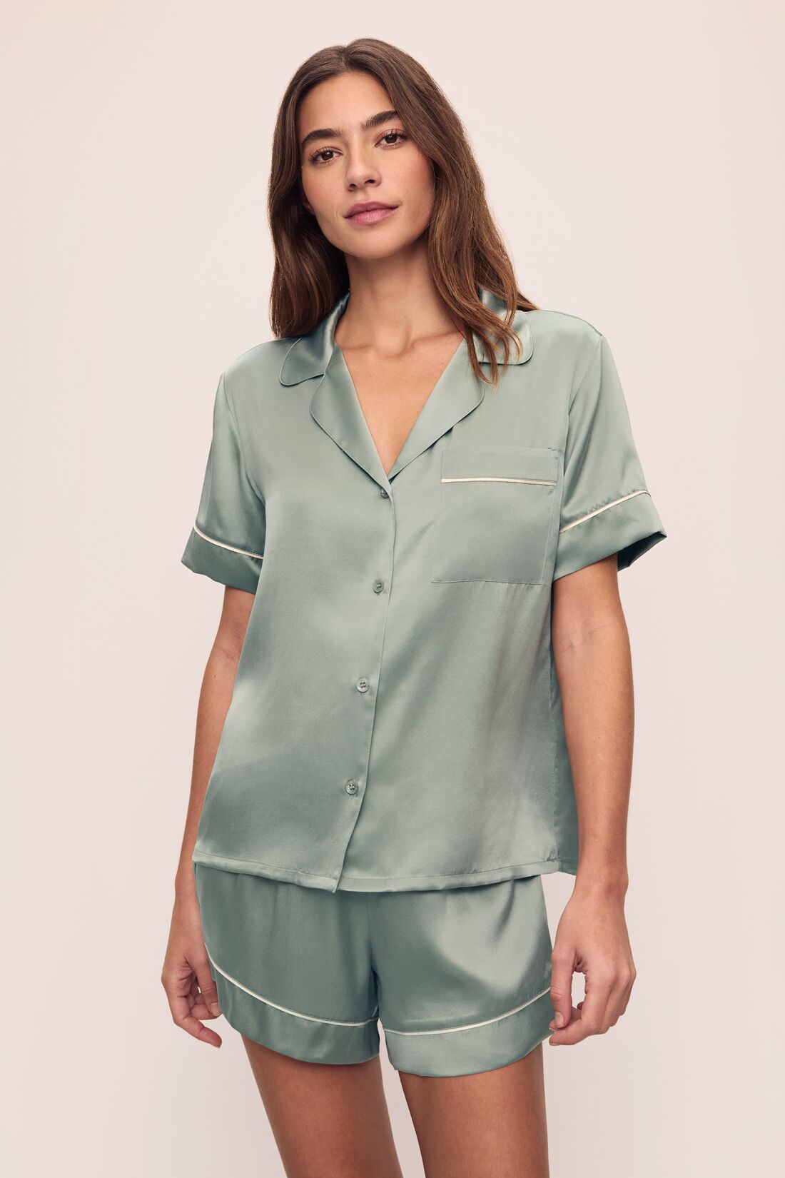 Model is wearing Inez Washable Silk Short PJ Set in Eucalyptus/Ivory