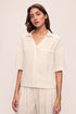 Model is wearing Tencel Woven Short Sleeve in Almond Heather
