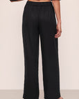 Model wears Tencel Woven Pant in Black