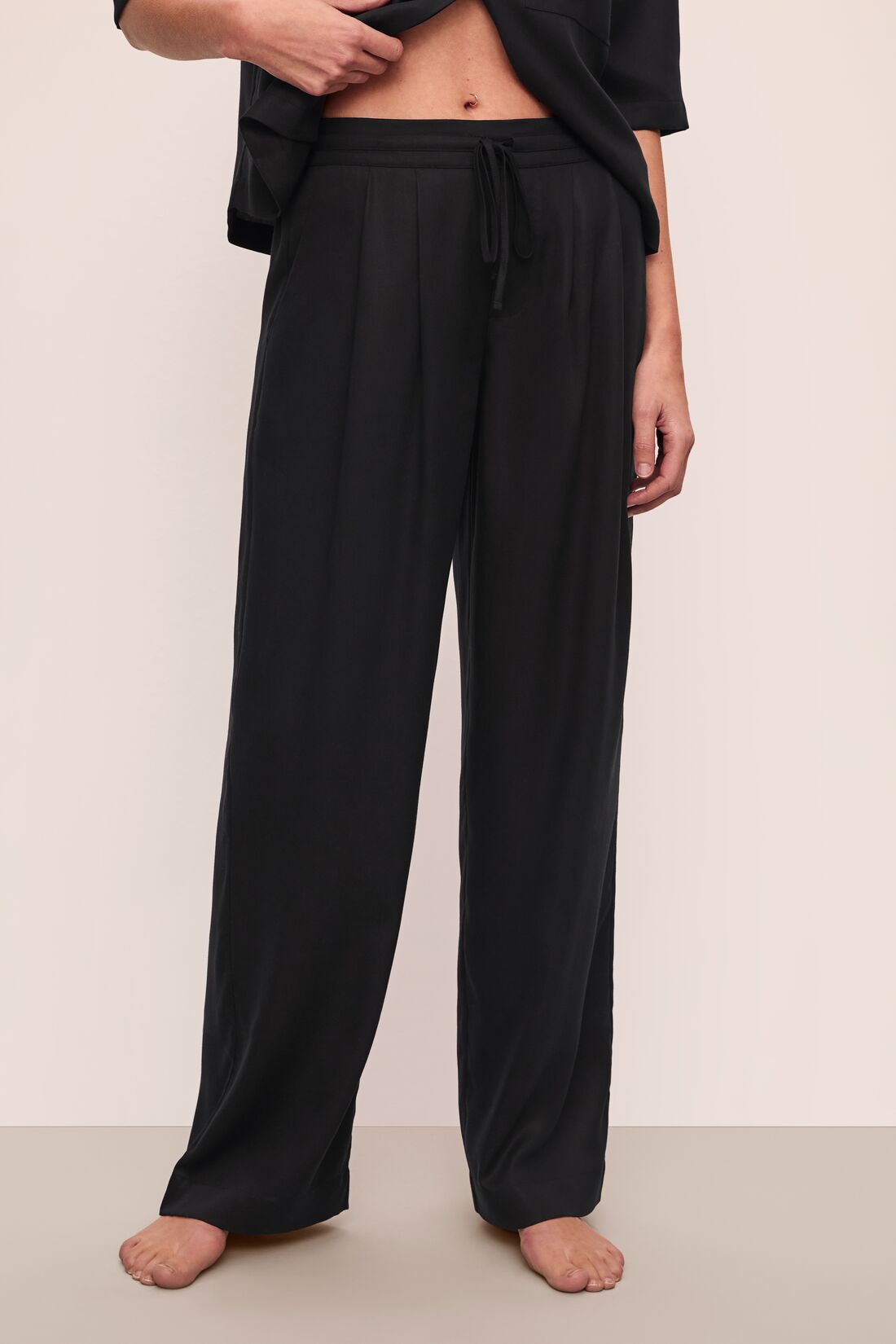 Model wears Tencel Woven Pant in Black