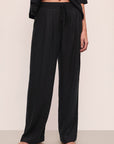 Model wears Tencel Woven Pant in Black