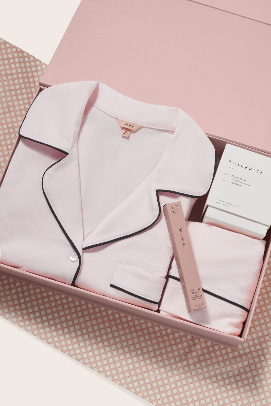 Image of a Gift box with Gisele TENCEL™ Modal Relaxed Short PJ Set in Sorbet Pink/Black, Rose Cuticle Oil and a Brooklyn Candle - Tuileries Escapist.