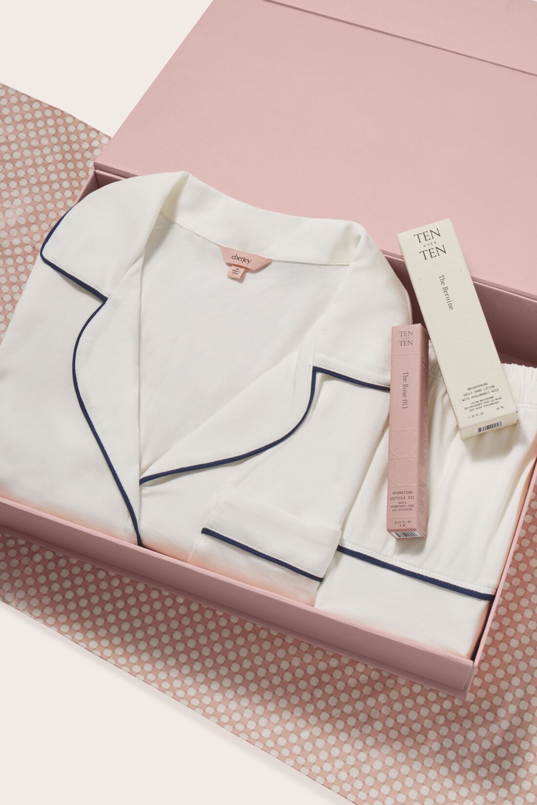 Image of a Gift box with Gisele TENCEL™ Modal Relaxed Short PJ Set in Pure Ivory/Navy, The Rose Cuticle Oil and the Heroine Hand Lotion