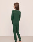 Model wears Kids TENCEL™ Modal Unisex Long PJ Set in Forest Green/Ivory.