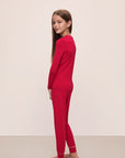 Model wears Kids TENCEL™ Modal Unisex Long PJ Set in Haute Red/Ivory.