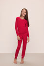 Model wears Kids TENCEL™ Modal Unisex Long PJ Set in Haute Red/Ivory.