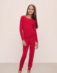 Model wears Kids TENCEL™ Modal Unisex Long PJ Set in Haute Red/Ivory.