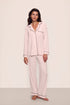 Model is wearing Gisele TENCEL™ Modal Long PJ Set in Sorbet Pink/Black