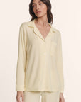 Model is wearing Gisele TENCEL™ Modal Long PJ Set in Buttercream/Ivory