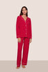 Model is wearing Gisele TENCEL™ Modal Long PJ Set  in Holly Red/Ivory