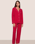 Model is wearing Gisele TENCEL™ Modal Long PJ Set  in Holly Red/Ivory