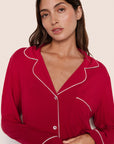 Model is wearing Gisele TENCEL™ Modal Long PJ Set  in Holly Red/Ivory