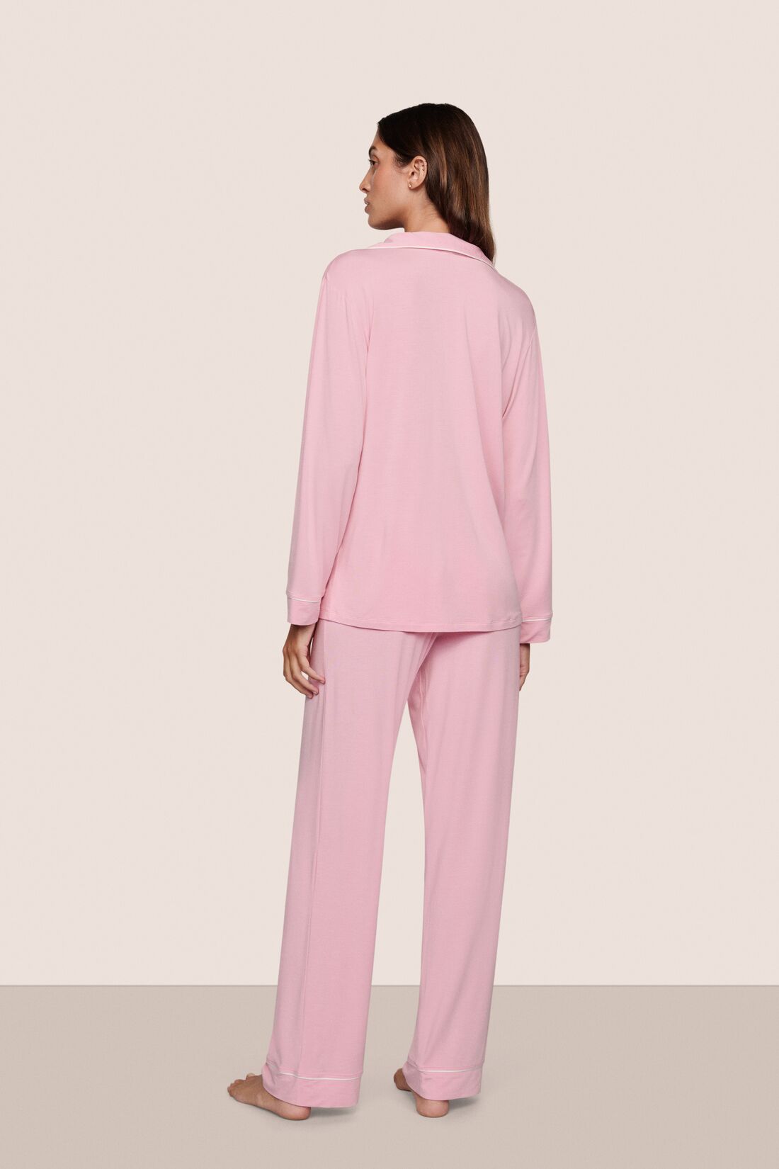 Model is wearing Gisele TENCEL™ Modal Long PJ Set  in Pink Nectar/Ivory