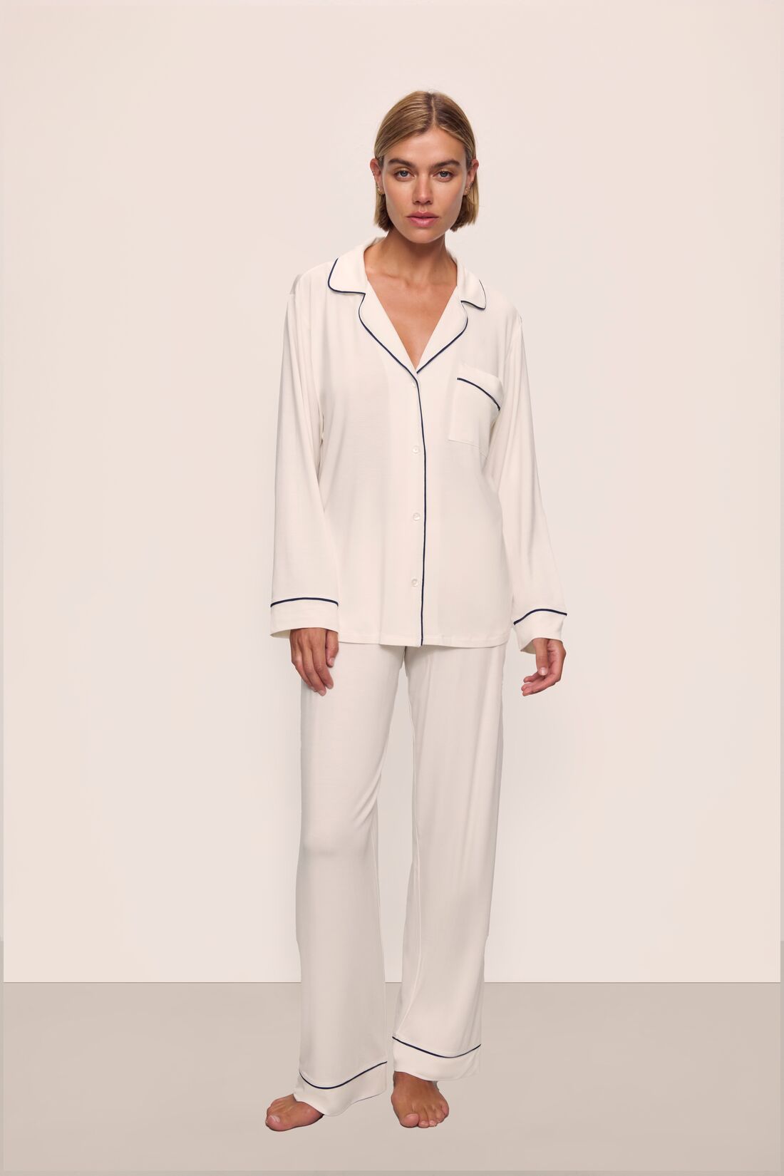Model wears Gisele TENCEL™ Modal Long PJ Set in Pure Ivory/Navy