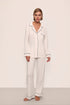 Model wears Gisele TENCEL™ Modal Long PJ Set in Pure Ivory/Navy