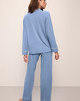 Model wears Gisele TENCEL™ Modal Long PJ Set in wedgewood blue/ivory.