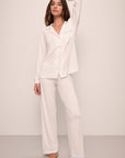 Model wears Gisele TENCEL™ Modal Long PJ Set in white/ice blue.