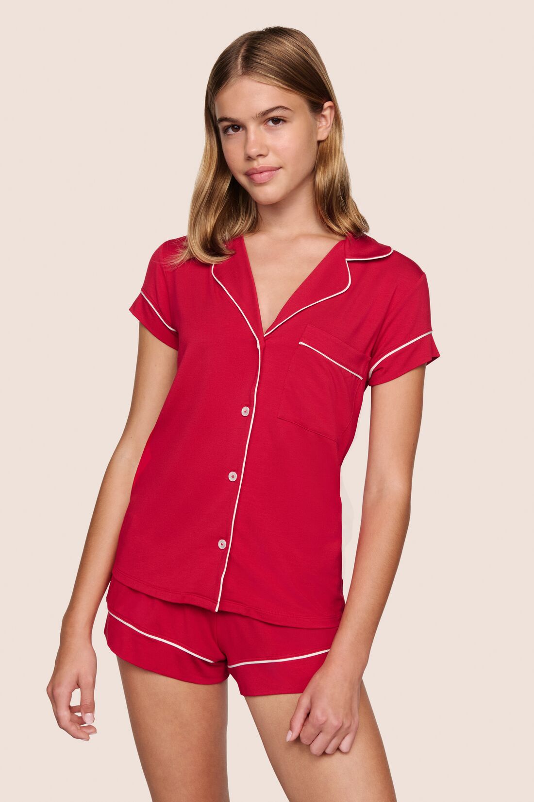 Model is wearing Gisele TENCEL™ Modal Shortie Short PJ Set in Holly Red/Ivory