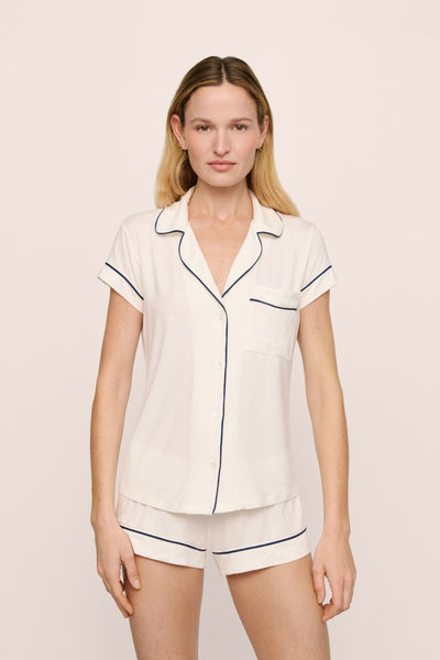 Model is wearing Gisele TENCEL™ Modal Shortie Short PJ Set in Pure Ivory/Navy