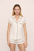 Model is wearing Gisele TENCEL™ Modal Shortie Short PJ Set in Pure Ivory/Navy