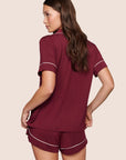 Model is wearing Gisele TENCEL™ Modal Relaxed Short PJ Set  in Bordeaux/Ivory