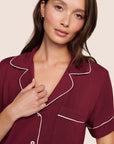Model is wearing Gisele TENCEL™ Modal Relaxed Short PJ Set  in Bordeaux/Ivory