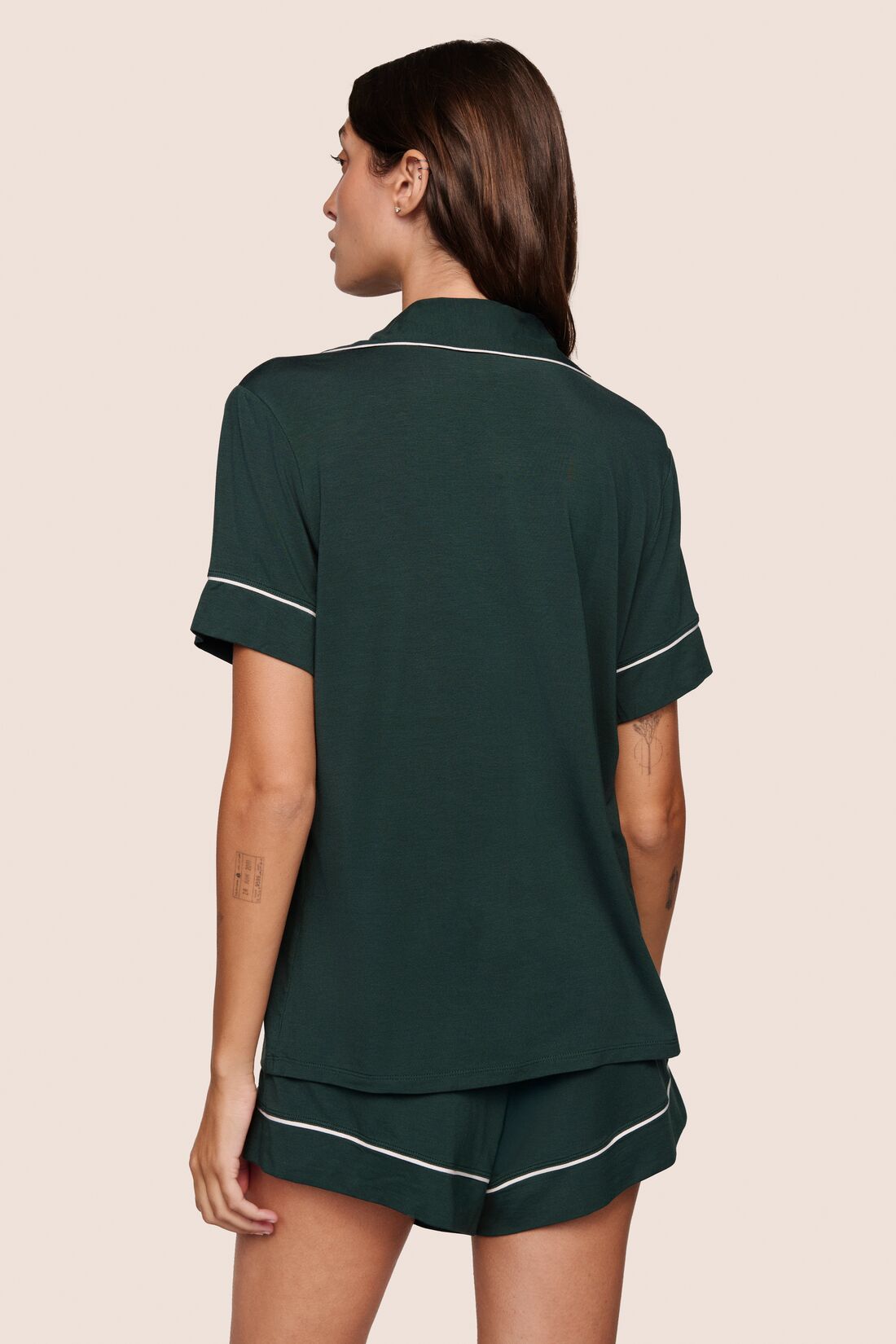 Model is wearing Gisele TENCEL™ Modal Relaxed Short PJ Set  in Pine/Ivory