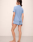 Model wears Gisele TENCEL™ Modal Relaxed Short PJ Set in wedgewood blue/ivory.