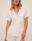 Model wears Gisele TENCEL™ Modal Relaxed Short PJ Set in white/ice blue.