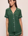 Model wears the Gisele TENCEL™ Modal Relaxed Short PJ Set in Forest Green/Ivory.