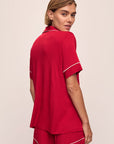 Model wears the Gisele TENCEL™ Modal Relaxed Short PJ Set in Haute Red/Ivory.