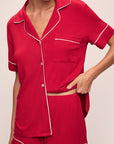 Model wears the Gisele TENCEL™ Modal Relaxed Short PJ Set in Haute Red/Ivory.